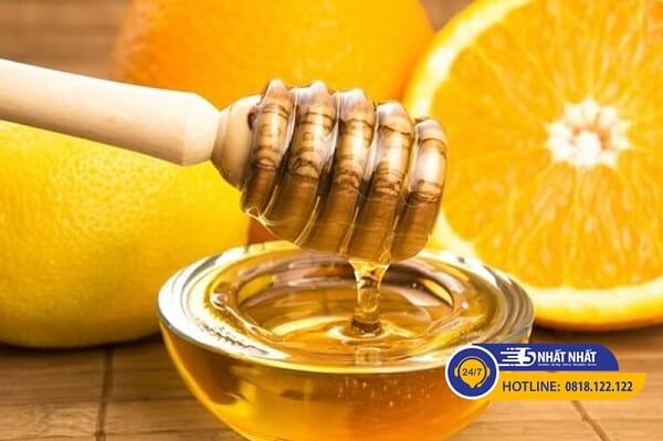 giải rượu bằng nước cam pha mật ong